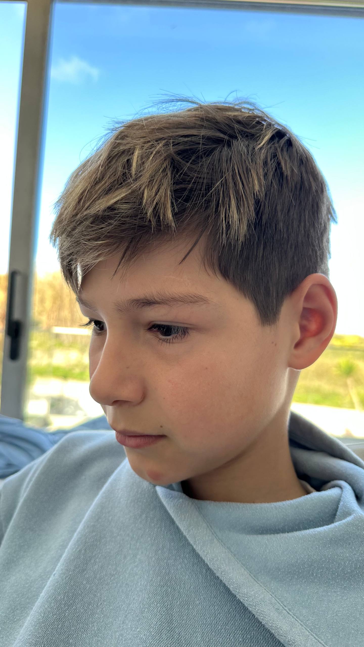 Boy looking at Mac screen